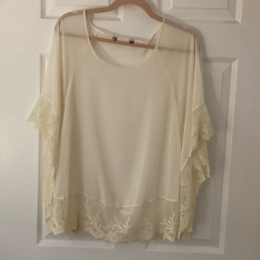 Express cream poncho with lace trim